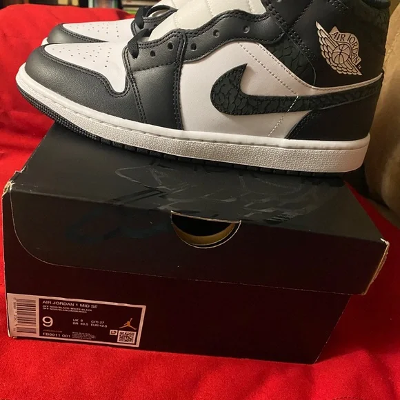 Jordan 1 Mid Black and White Athletic Shoes New never worn.